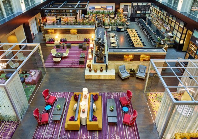 birds eye view of the atrium space at the nines hotel
