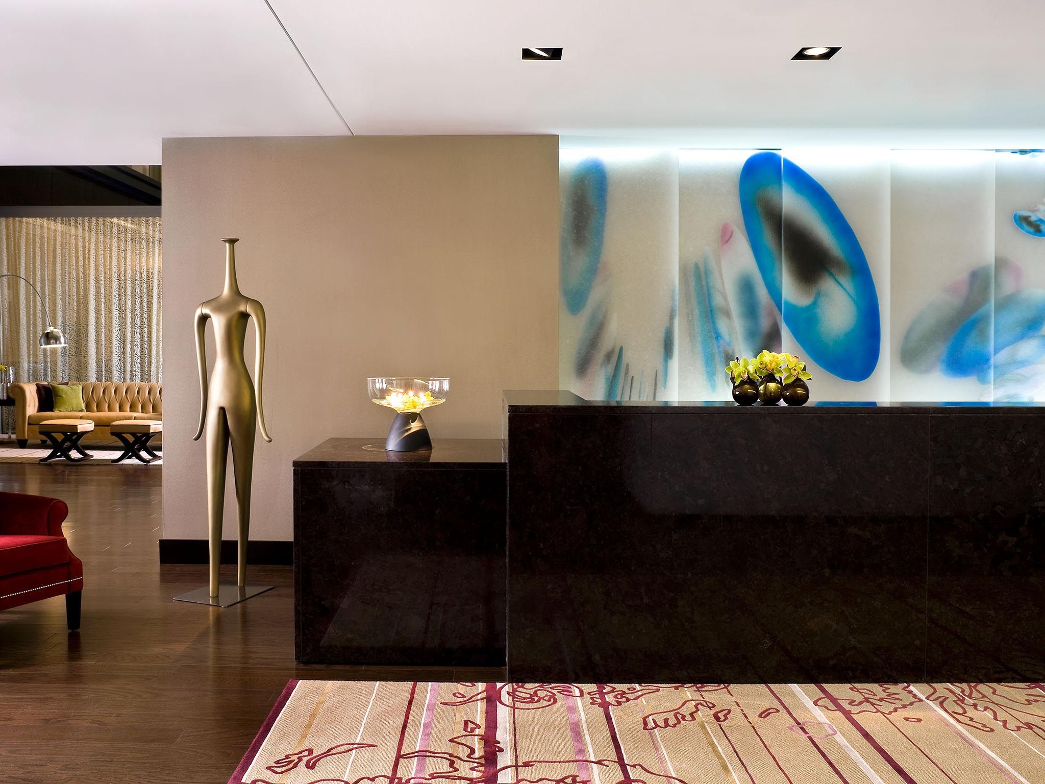 modern art fills the lobby of the nines hotel