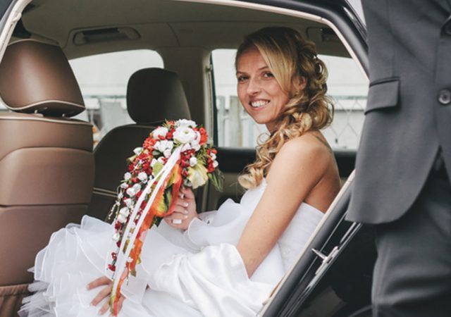 groom opened car door for his bride to get out